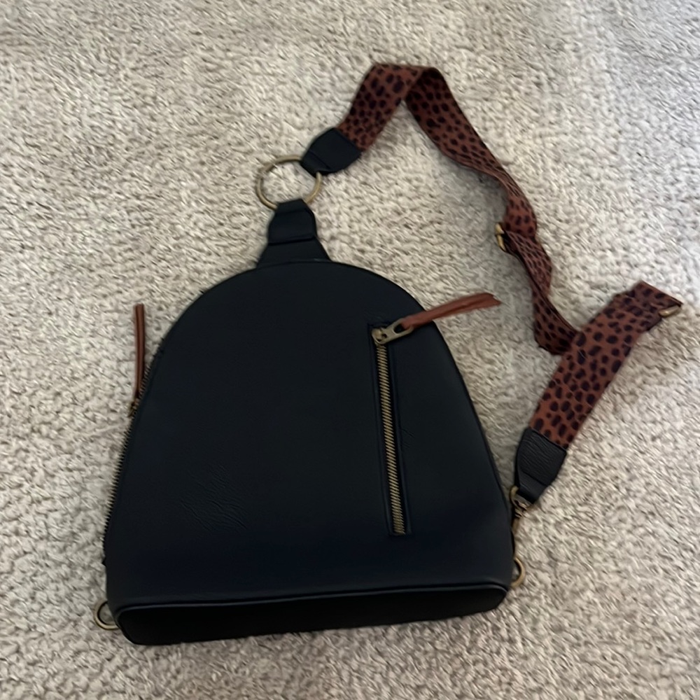 Trendy sling backpack purse